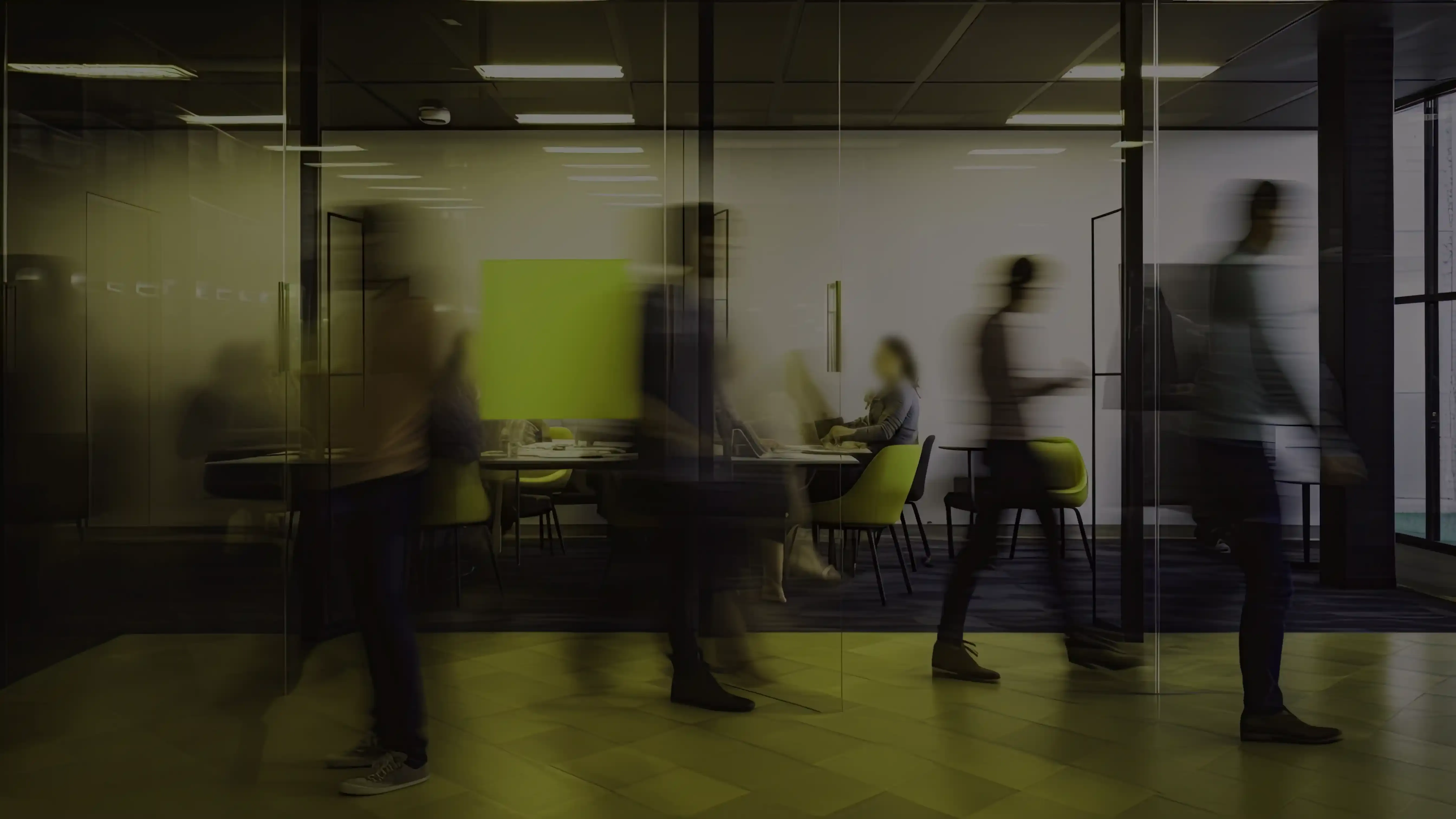 blurred image of people in office
